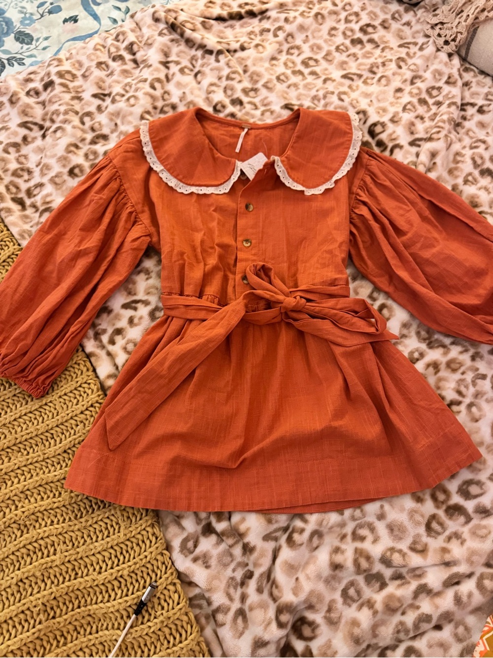 The Free People Orange Woven Cotton Short Collared Button Balloon Sleeved flair.